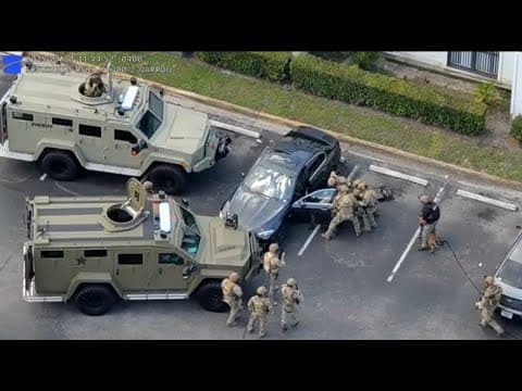 VIDEO: Marine veteran arrested, accused of shooting at people and barricading himself outside Tampa