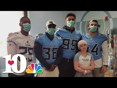 Young football fan battling rare cancer gets a special visit from the Vols and Titans