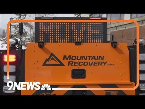 Tow truck company installs signs for travel safety