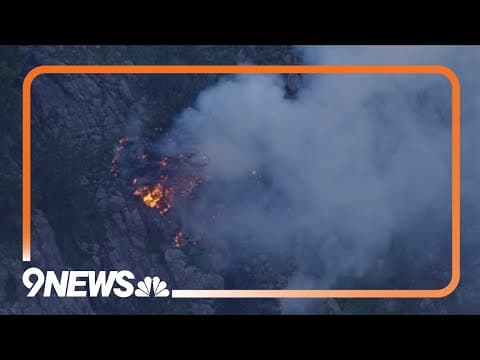Small fire burning west of Boulder