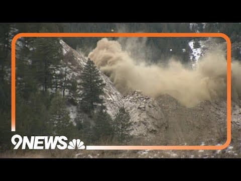 CDOT workers gather to watch rock scaling blast as I-70 Floyd Hill project continues