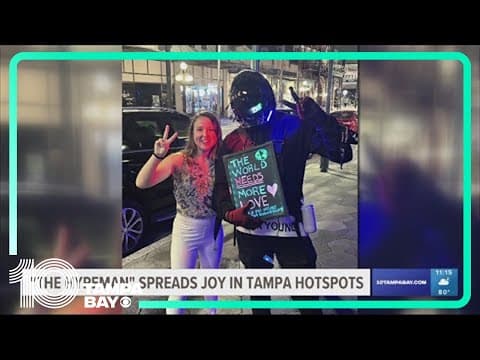 Masked man with push for peace wanders Tampa hotspots spreading joy