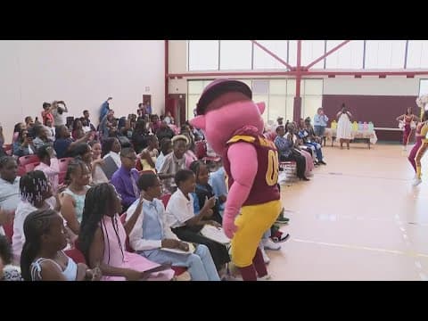 Washington Commanders surprise graduating 5th graders at CW Harris Elementary School