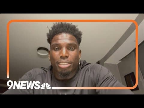 Body camera video shows police forcefully pulling Tyreek Hill out of his car