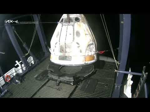 SpaceX capsule returns to Earth with four crew members