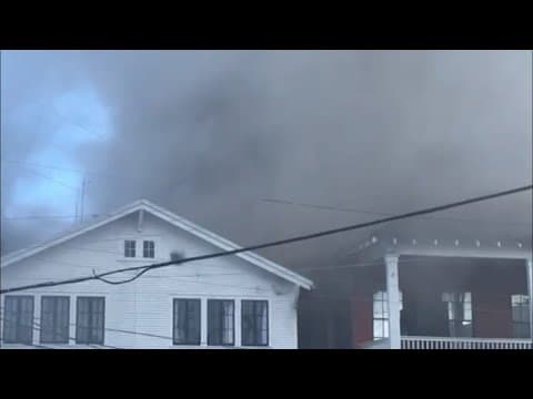 Fire crews battle building fire in Lower Garden District across from popular restaurant