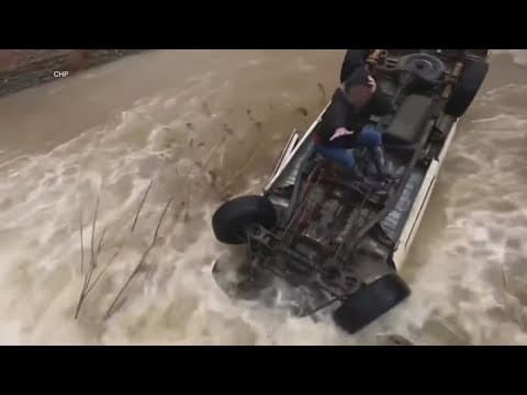 Woman trapped in floodwaters for 15 hours before being rescued