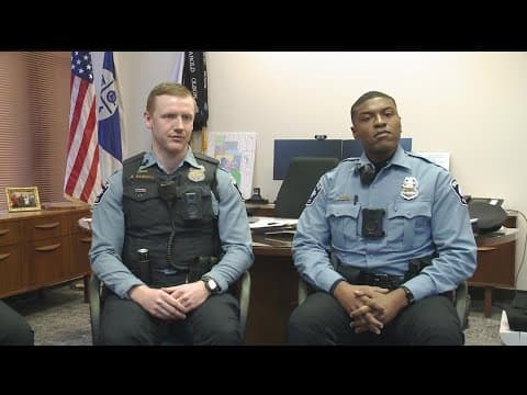 Officers called heroes for rescuing couple from burning home
