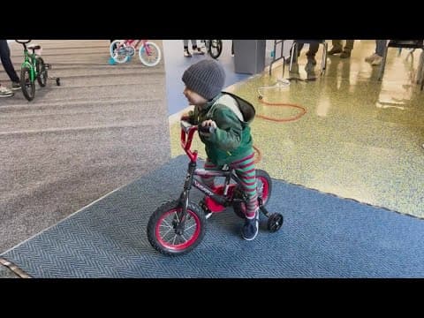 NCASCAR driver Chase Briscoe gifts new bicycles to 700 kids