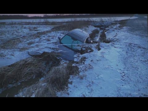 Jackson County sheriff's deputy saves woman trapped in car from rising floodwaters