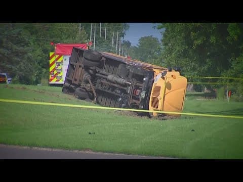 Ohio school bus overturns after crash with minivan, leaving 1 child dead and 23 injured
