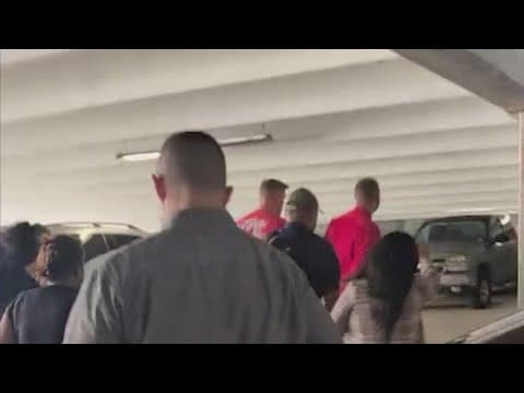 Protesters gather after immigration arrest inside Houston courthouse