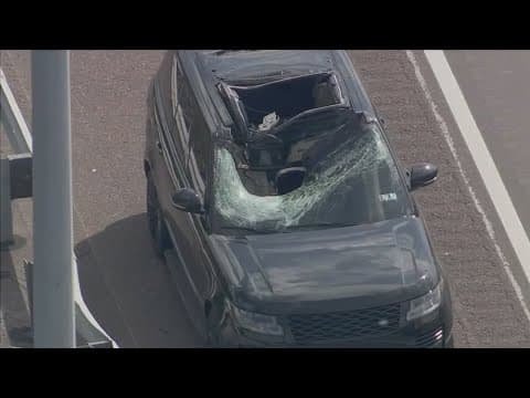 Tire flies off truck and crashes into SUV