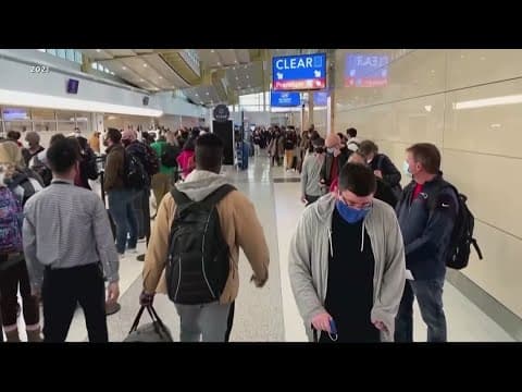 How is the weather impacting the Thanksgiving travel rush?