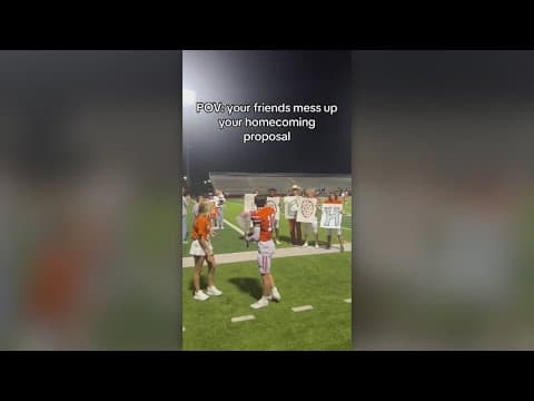 "Oh it's backwards!" Texas homecoming proposal goes viral after teammates hold signs backward