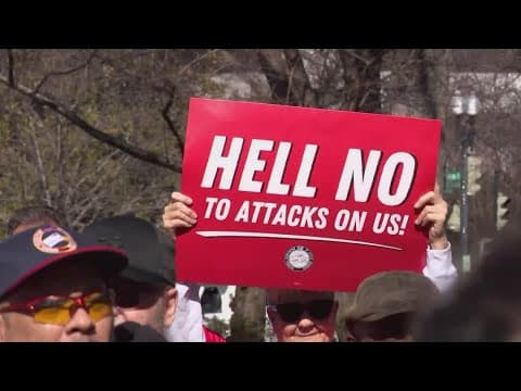 'A direct attack' | Postal service workers rally to defend USPS