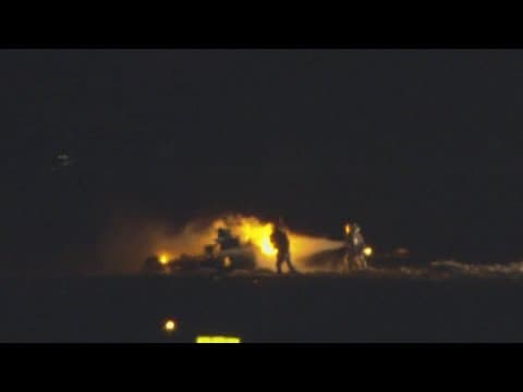 Probes launched into deadly plane crash in Japan