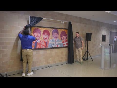 This Beatles mural was made out of hundreds of Rubik's Cubes