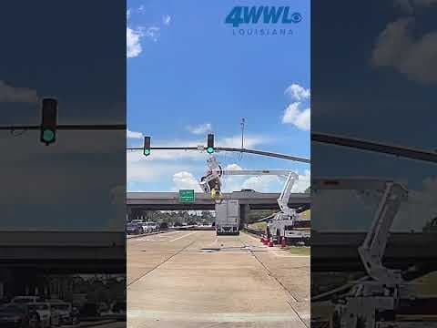 Dashcam captures 18-wheeler clipping lift truck, worker left dangling