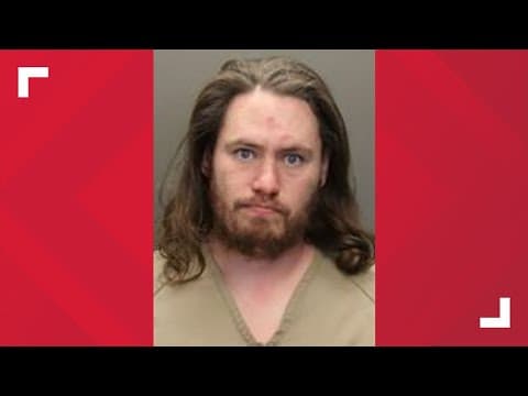 Records: Columbus man accused of dragging woman by her hair while holding ax during house inspection
