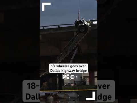18-wheeler goes over Dallas highway bridge during early-morning storms