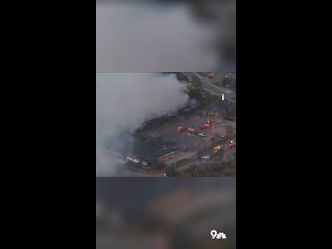 Smoke plume over Nederland from shopping center fire