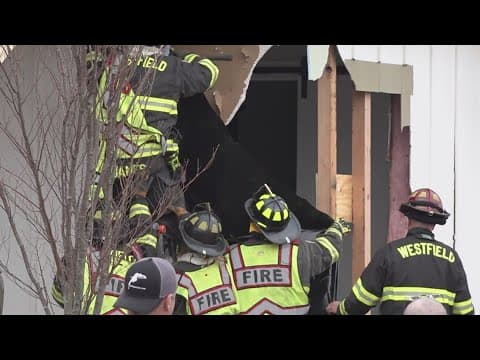 Car strikes building in Westfield