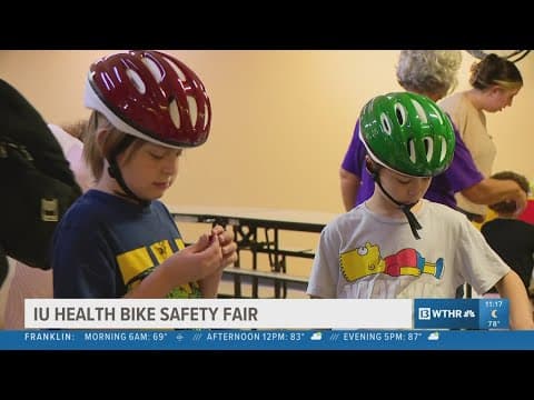 Kids get fitted helmets at IU Health Bike Safety Fair