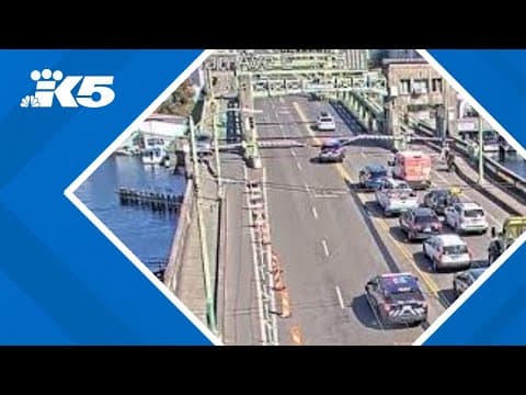 Car jumps University Bridge