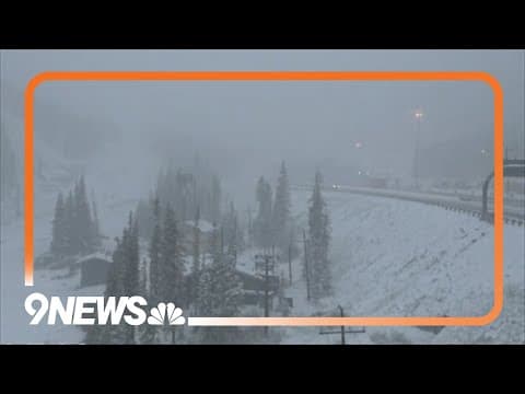 Snow falls in mountains of Colorado west of Denver