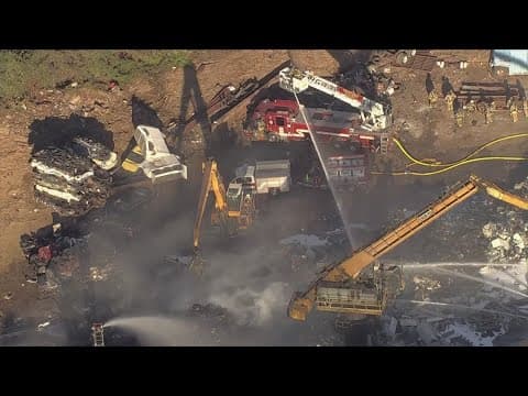 Crews respond to 2-alarm fire at recycling center in Lorton