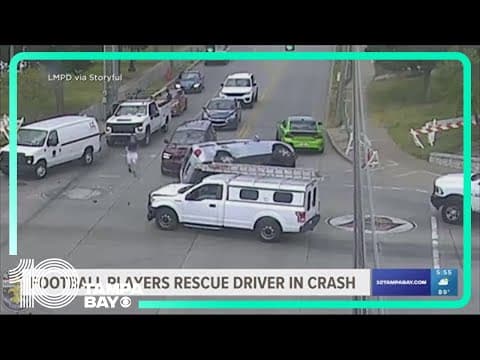 Football players rescue driver in crash