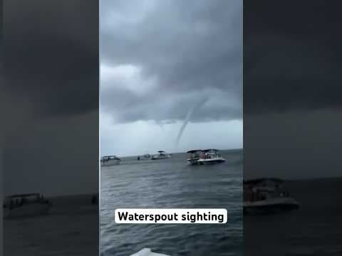 Waterspout over Lake Pontchartrain on the 4th of July #waterspout #weathernews #lakepontchartrain