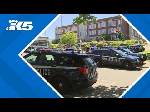 As Seattle police increase their presence at Garfield High School, community opinion remains mixed