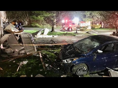 Driver flees the scene after car crashes into garage, hits vehicle inside