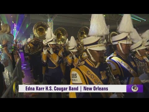 Edna Karr H.S. Cougar Band marches in Krewe of Bacchus