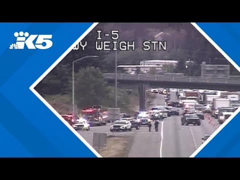 Traffic cam shows police response to stabbing, shooting on I-5
