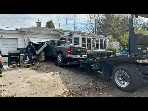 Pickup truck crashes into Carmel home