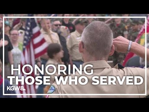 Scouts of America place flags to honor veterans at Willamette National Cemetery