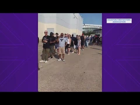 Houston firefighters line up to receive backpay checks from $650 million settlement