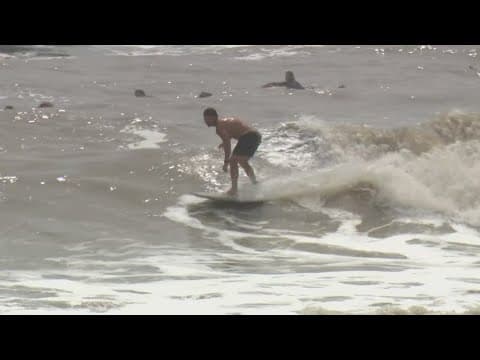 Surfers in Galveston take advantage of big waves from Hurricane Francine
