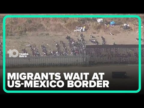 Hundreds of migrants wait to claim asylum in U.S.