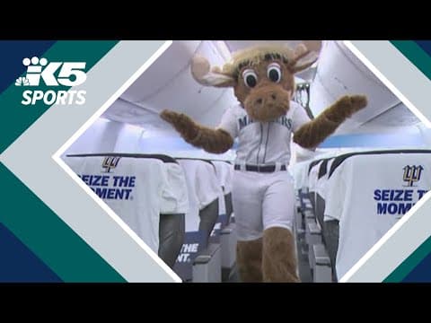 Excited Mariners fans board flight to Detroit