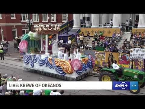 Queen of Krewe of Okeanos and her maids toast at Gallier Hall