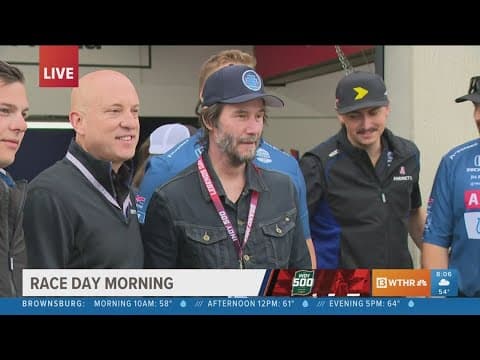 Actor Keanu Reeves visits Gasoline Alley on race day morning