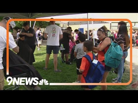 Denver Nuggets team up with Denver Police to give out school supplies to hundreds of families