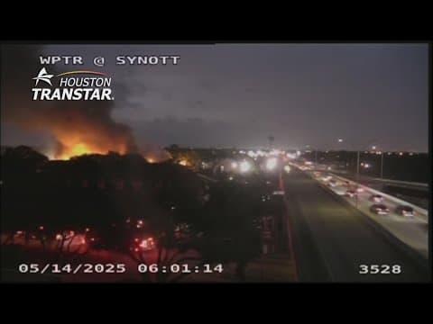 Large fire burning seen from traffic cameras on Westpark Tollway in west Houston