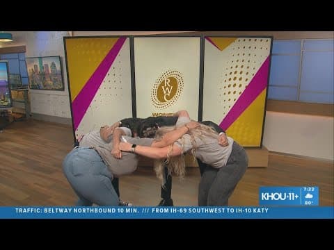 Jacob Rascon gets a lesson on how to do a rugby pass and scrum