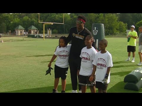 Commanders' KJ Henry gives back