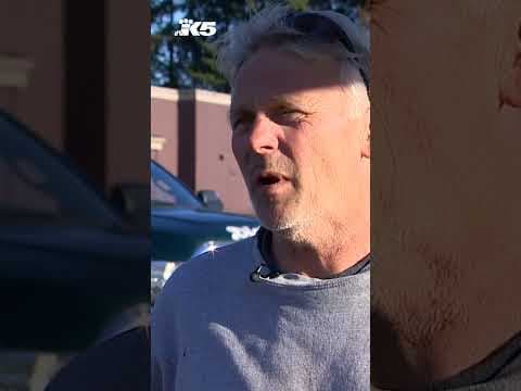 Car speeds through stop sign, crashes into semi-truck in Everett